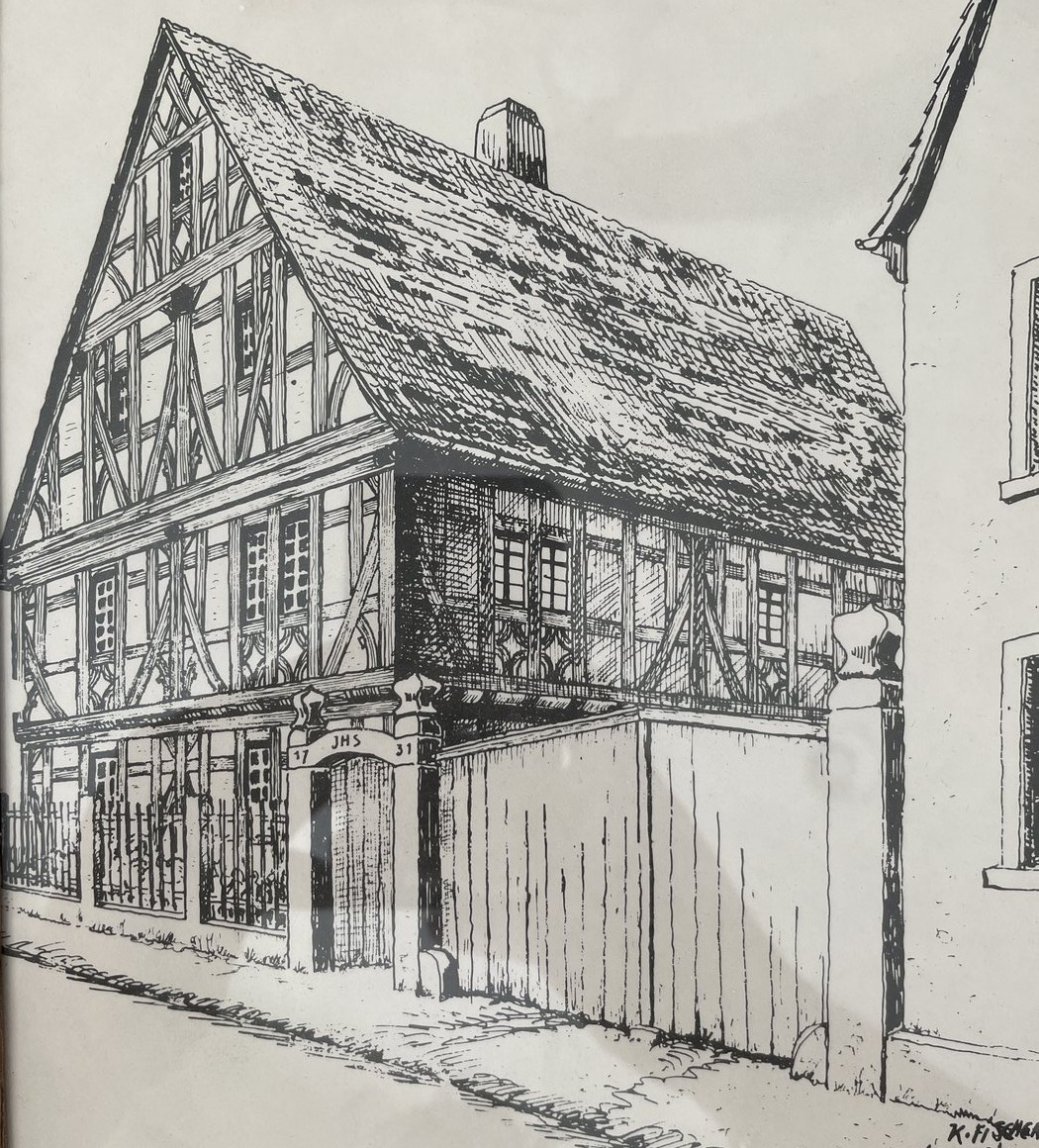 A detailed pencil drawing of a timber-framed German museum, used as inspiration for the mark