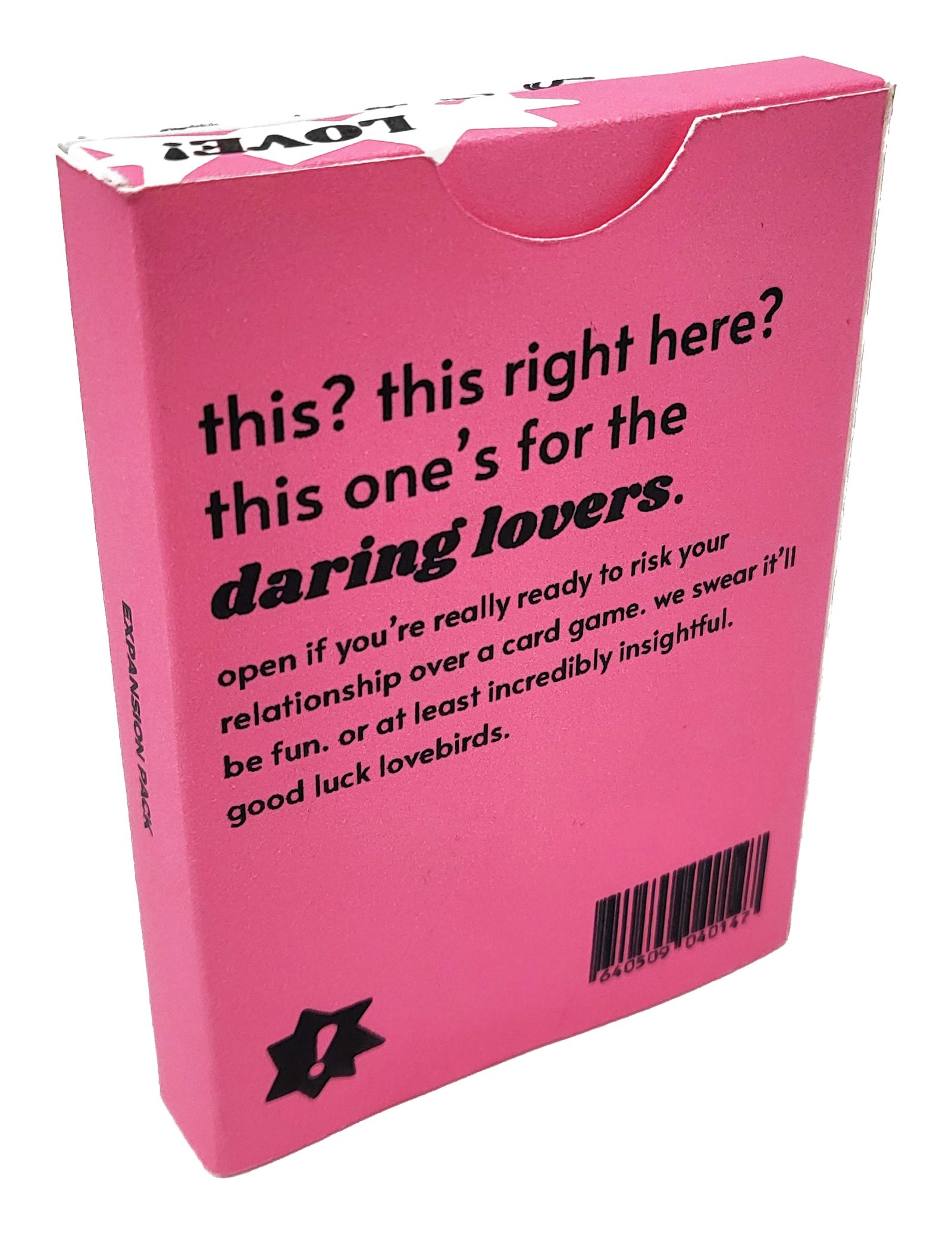 The back of the expansion box in pink: “this? this right here? this one’s for the daring lovers.” with the warning copy, a “!” star, and a barcode