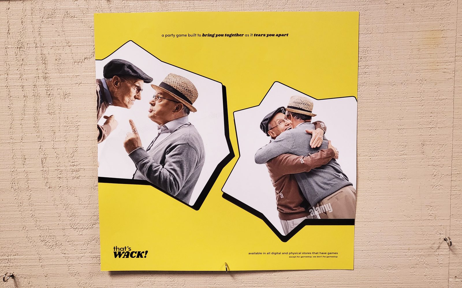 The printed poster pinned to a wooden wall